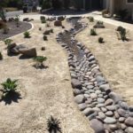 Low maintenance Using Decomposed Granite And an artificial water river channel