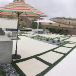 Concrete design with artificial grass